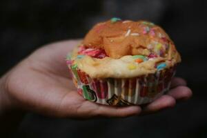 Bread sprinkled with delicious colorful sprinkles for breakfast. photo