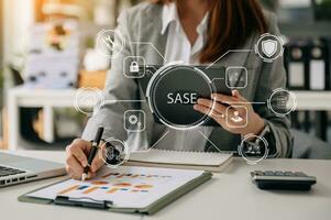 SASE Secure Access Service Edge concept Hand touching Secure Access Service Edge icon on virtual screen background, password, network, framework and support technology in office photo