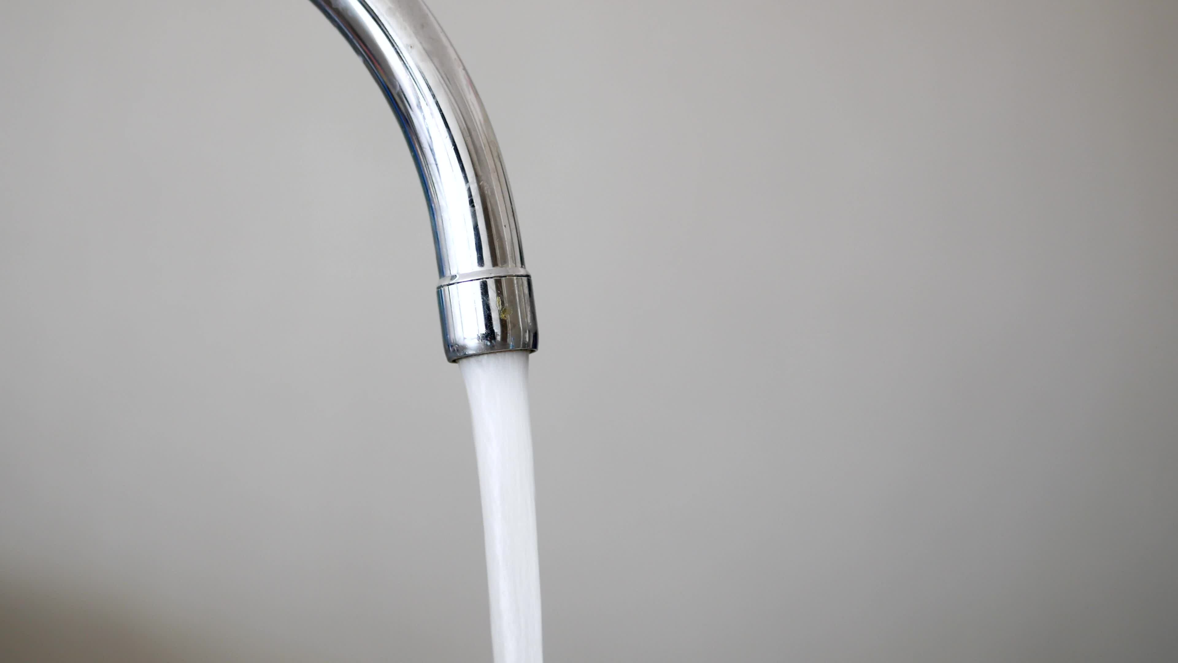 water pouring from a faucet tap slow motion 30821520 Stock Video at