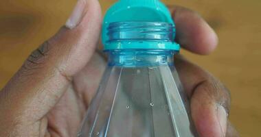 Small Water Plastic Bottle Rotates On Stock Footage Video (100