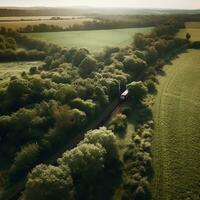 An aerial view of a train passing through a lush countryside generative ai photo