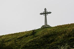 Ancient cross in Kamyanets-Podilskyi photo