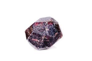 Macro of a mineral garnet stone on a white background photo