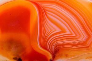 Macro mineral orange agate in crystals on white background photo