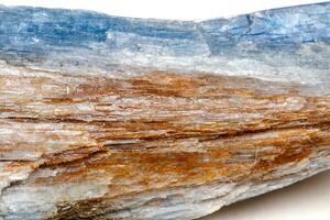 Macro mineral stone Kyanite a white background photo