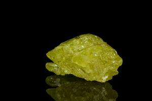 Macro mineral sulfur stone on a black background photo