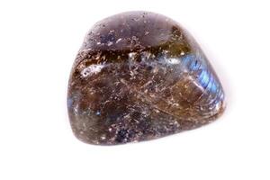 Macro mineral stone Labradorite on white background photo