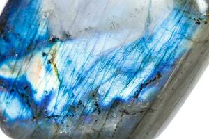 Macro mineral stone Labradorite on white background photo