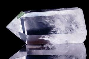 Macro mineral stone Crystal rock crystal on a black background photo