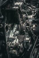 Car timing chain in cutaway engine photo