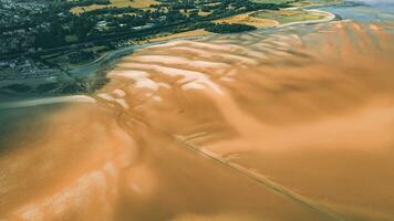 Aerial view of a little town surrounded by beautiful nature Llanfairfechan, North Wales, Cymru, UK photo