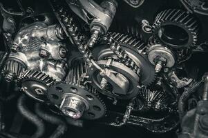 Car timing chain in cutaway engine photo