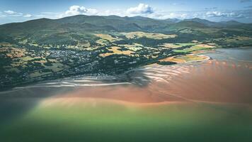 Aerial view of a little town surrounded by beautiful nature Llanfairfechan, North Wales, Cymru, UK photo