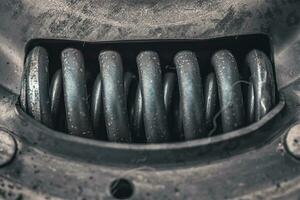 Old clutch durring replacement in a garage close up photo