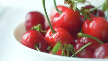 ripe fresh cherry on a white tray video
