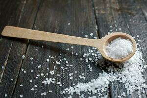 Salt on wooden Table photo