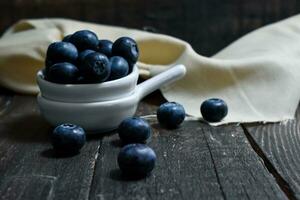 Blueberries on wooden Background photo