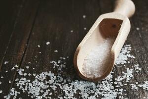 Salt on wooden Table photo