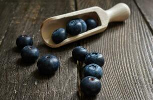 Blueberries on wooden Background photo