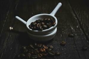 Coffee Beans on wooden Table photo