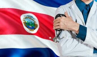 Health and care with flag of Costa Rica. Costa Rica national health concept, Doctor with stethoscope on Costa Rica flag photo