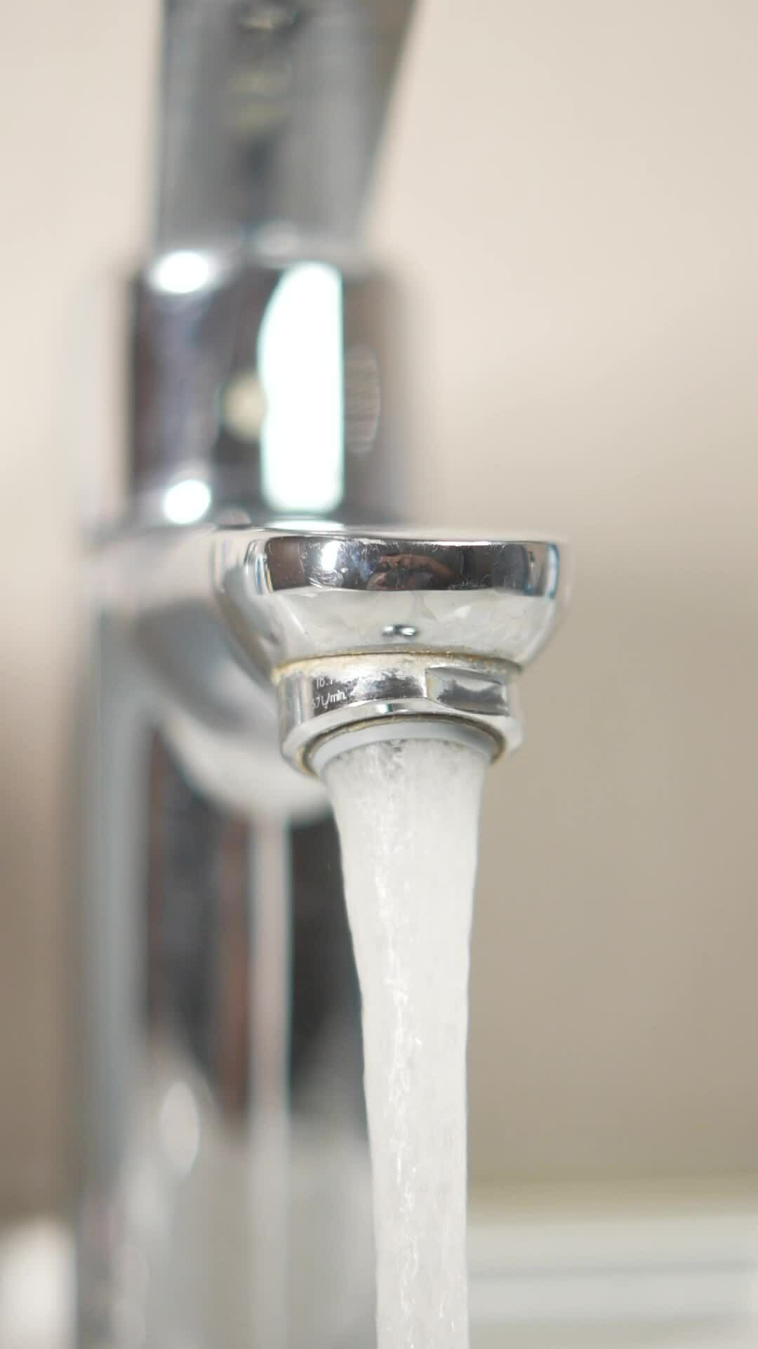water pouring from a faucet tap slow motion 30824404 Stock Video at