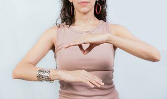 People gesturing in sign language isolated. Unrecognizable woman gesturing in sign language, Interpreter gesturing in sign language photo