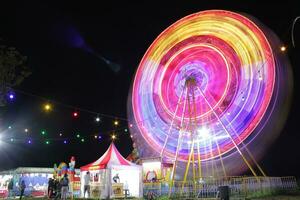 Ferris Wheel ath the dark night photo