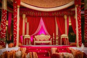 an indian wedding ceremony with red and gold decorations. AI-Generated photo