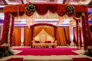 an indian wedding ceremony with red carpet and gold decorations. AI-Generated photo