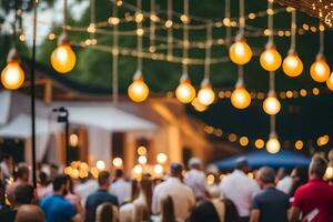 a group of people sitting at tables under string lights. AI-Generated photo