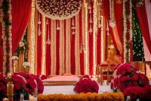 un Boda ceremonia con rojo y oro decoraciones generado por ai foto