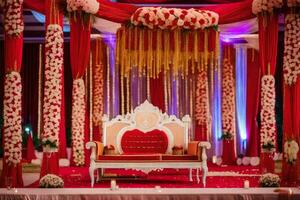 a red and white wedding stage decorated with flowers. AI-Generated photo