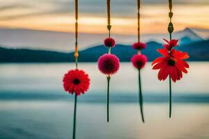 red flowers hanging from a rope over water. AI-Generated photo