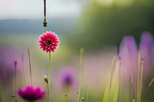 un rosado flor es en pie en el medio de un campo. generado por ai foto