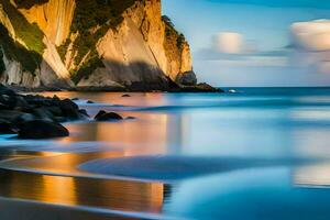 the beach at sunset with rocks and water. AI-Generated photo