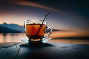 un taza de té se sienta en un mesa con un lago en el antecedentes. generado por ai foto