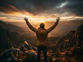 A hiker standing on a mountain peak, with a breathtaking sunset sky as the backdrop generative ai photo