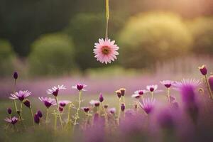 a pink flower hanging from a vine in a field. AI-Generated photo