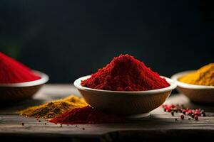 three bowls of red, yellow and green spices. AI-Generated photo