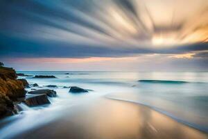 a long exposure photograph of the ocean and rocks. AI-Generated photo