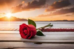 red rose on a wooden table with sunset in the background. AI-Generated photo