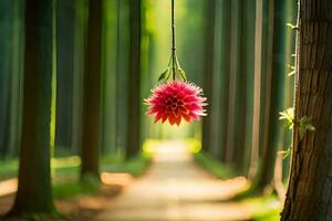 a pink flower hanging from a tree in a forest. AI-Generated photo