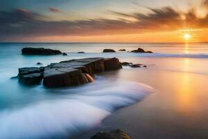 un hermosa puesta de sol terminado el Oceano con rocas y ondas. generado por ai foto