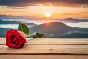 un soltero rojo Rosa se sienta en un de madera mesa en frente de un puesta de sol. generado por ai foto