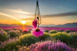 two pink flowers hanging from a chain in a field. AI-Generated photo