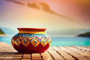 a colorful pot sitting on a table near the ocean. AI-Generated photo