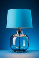 Vintage glass table lamp glowing gently isolated on a blue gradient background photo