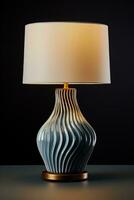 Modern ceramic table lamp on a dark surface background with empty space for text photo