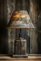 Rustic wooden table lamp on antique desk background with empty space for text photo
